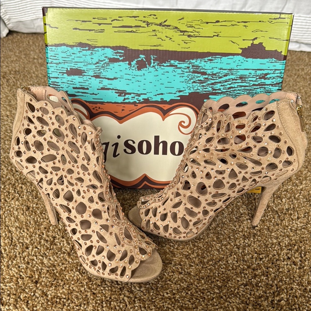 Beautiful suede and studded heels. Worn once .